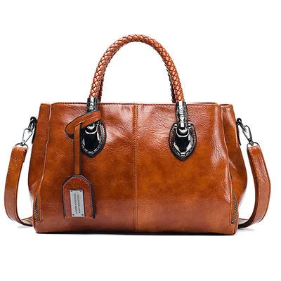 Pia | "Elegant leather handbag with braided handle".-Elly Rose