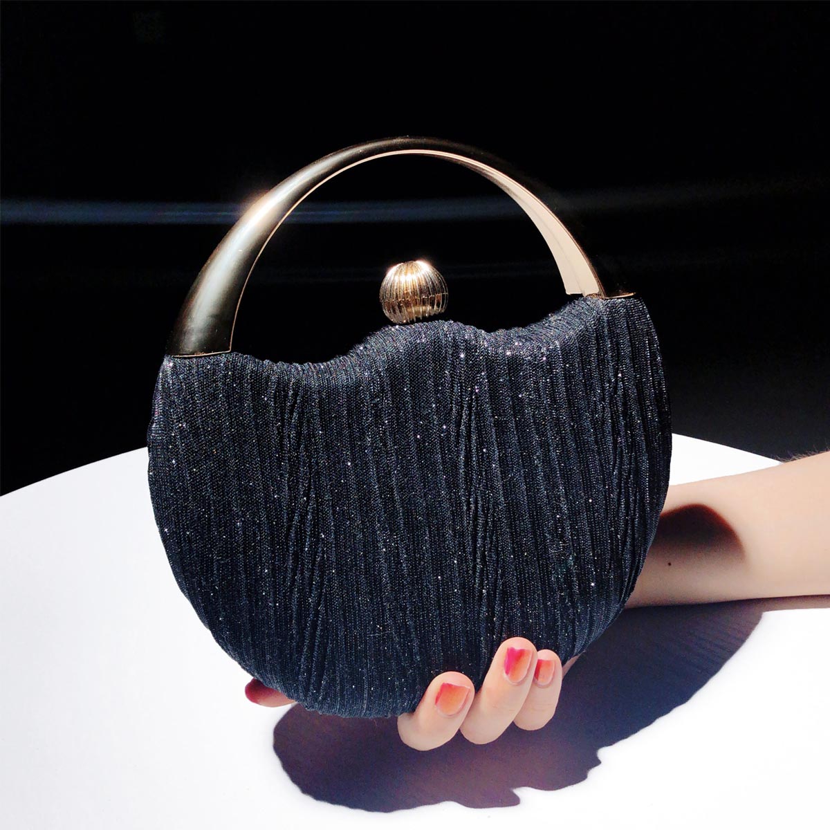 Chic clutch bag with metal handle - Leighton-Elly Rose