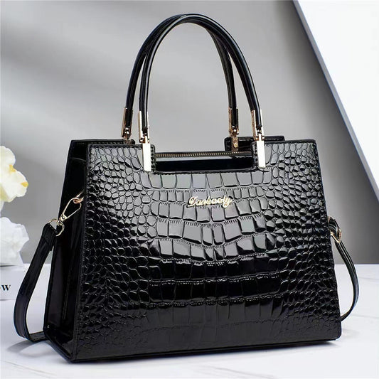 Wilja | Shiny leather handbag with crocodile pattern-Elly Rose