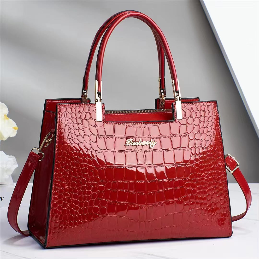Wilja | Shiny leather handbag with crocodile pattern-Elly Rose