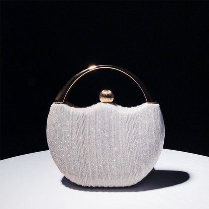 Chic clutch bag with metal handle - Leighton-Elly Rose