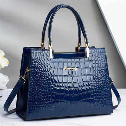 Wilja | Shiny leather handbag with crocodile pattern-Elly Rose