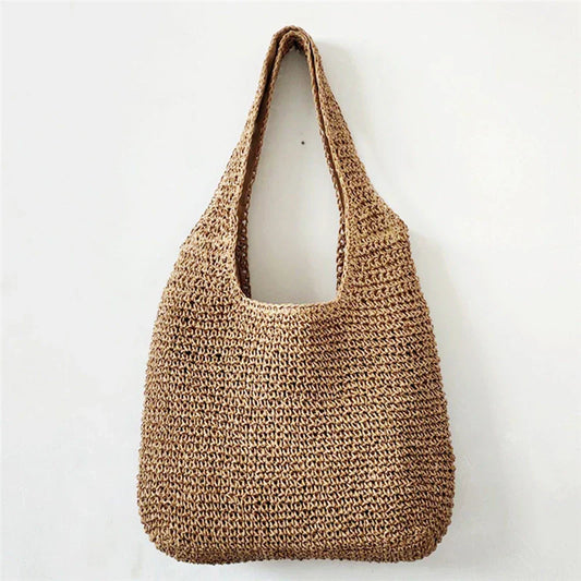 Casual shoulder bag in woven straw-Elly Rose