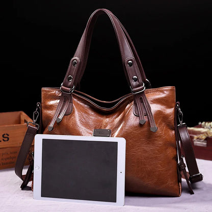Augusta | Soft leather bag with two handles and elegant details.-Elly Rose