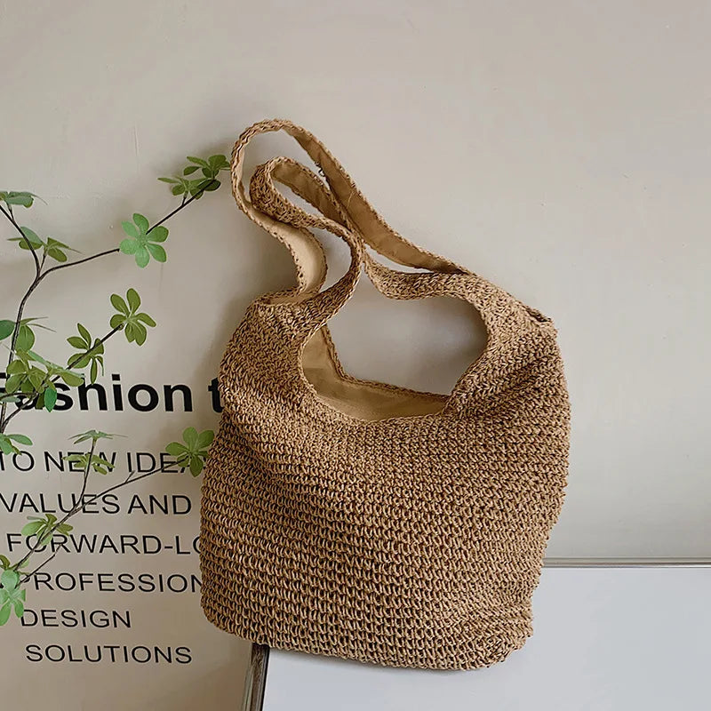 Round straw shoulder bag for summer - Satiro-Elly Rose