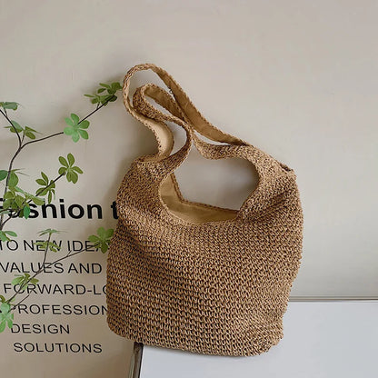 Round straw shoulder bag for summer - Satiro-Elly Rose
