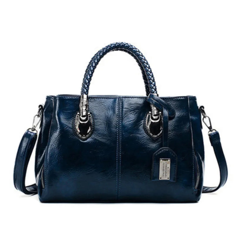 Pia | "Elegant leather handbag with braided handle".-Elly Rose