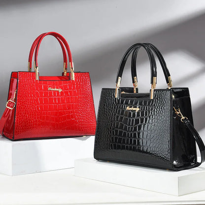 Wilja | Shiny leather handbag with crocodile pattern-Elly Rose